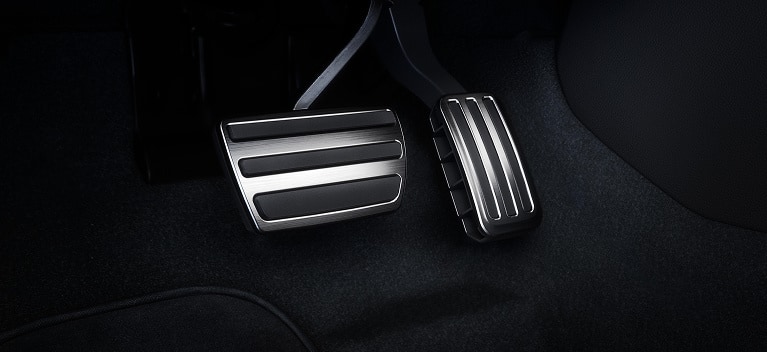 2025 Honda Civic Hatchback close up of the sport pedals with metallic finish (Compact Hatchback).